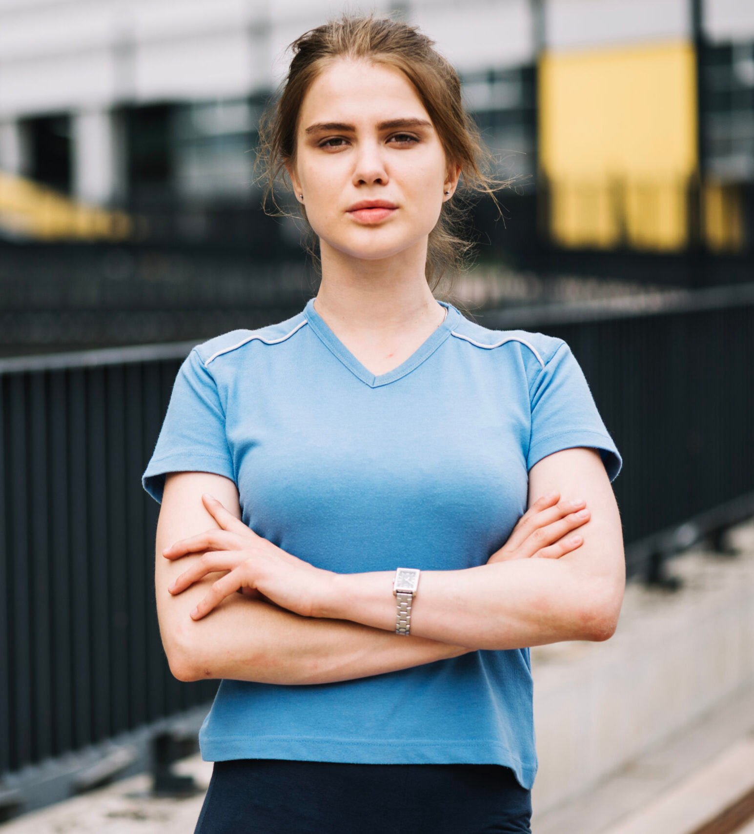 woman-standing-with-arms-crossed